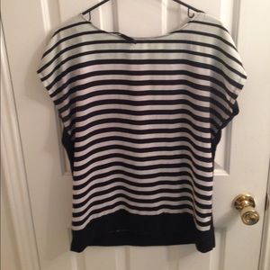 Light green, black, and white shirt