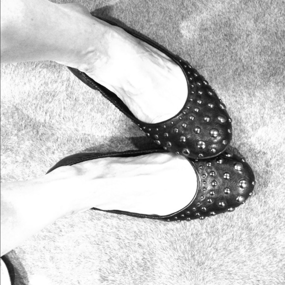 Black studded flats.