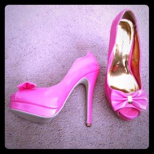 C. label Hot pink heels