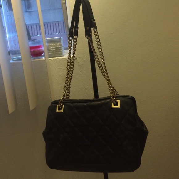 All black quilted purse