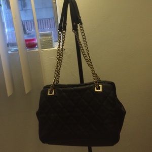 All black quilted purse