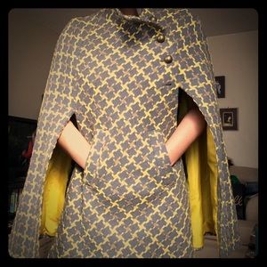 Grey and yellow poncho coat