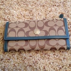 SOLD Brown Coach wallet with teal/green edges