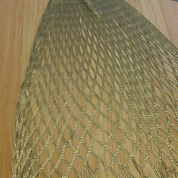Francesca's elegant gold scarf