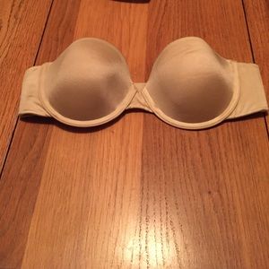 Nude strapless bra.