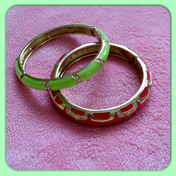 A pair of Gold toned, crystal, and enamel bracelet