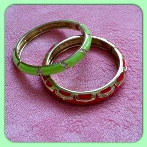 A pair of Gold toned, crystal, and enamel bracelet