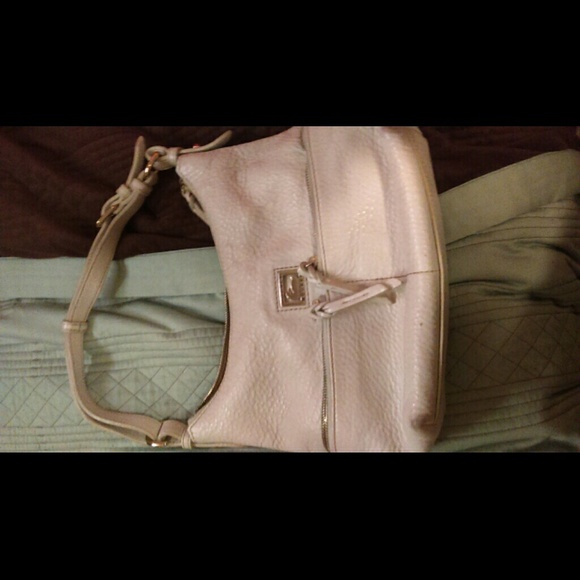 White with gold accents purse