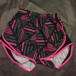 pink, grey and black patterned nike shorts