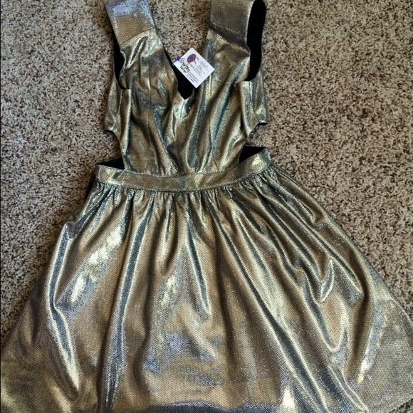 New with tags beautiful gold dress