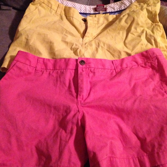 Two pair of shorts, size 16 pink and yellow