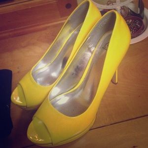 Bright yellow high heels