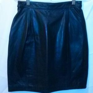 Short black leather skirt. Never worn.