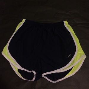 Navy and yellow Nike shorts