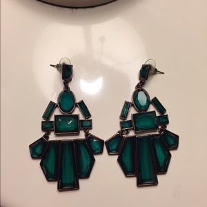 Green statement earrings