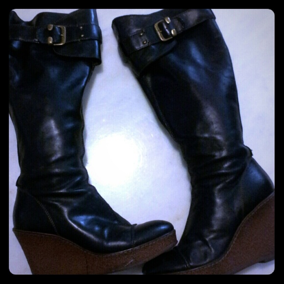 Knee high platform boots.