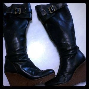 Knee high platform boots.