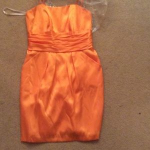 Tangerine, mid thigh, size 10, spaghetti strap