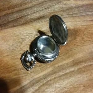 Pocket watch style storage locket