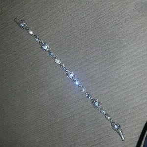 Silver bracelet with light blue stones