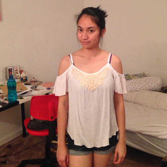 White top with crochet design