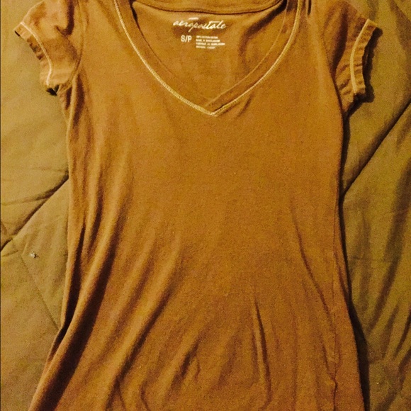 Brown V-neck.