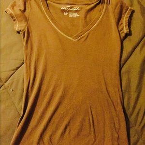 Brown V-neck.