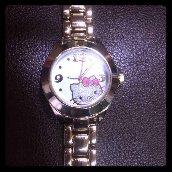 Brand new Authentic HELLO KITTY WATCH in gold tone