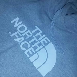 Grey North Face hoody.