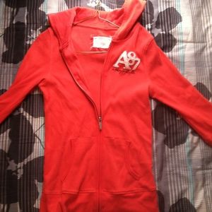 A coral, 3 quarter length jacket!