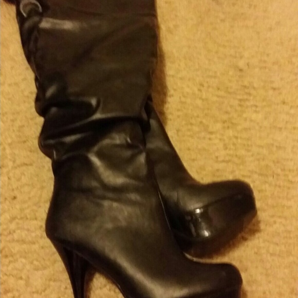 Thigh high leather boots