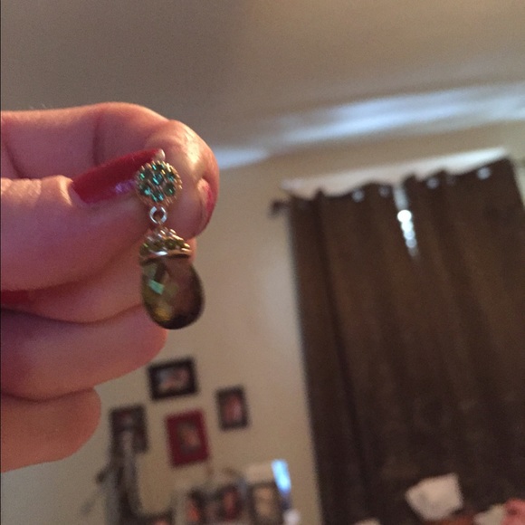 Pair of green dangling earrings