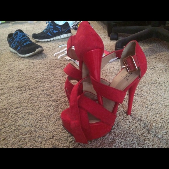 Red strappy platforms
