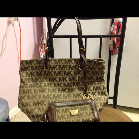 MK for $100.0 for both wallet & handbag...