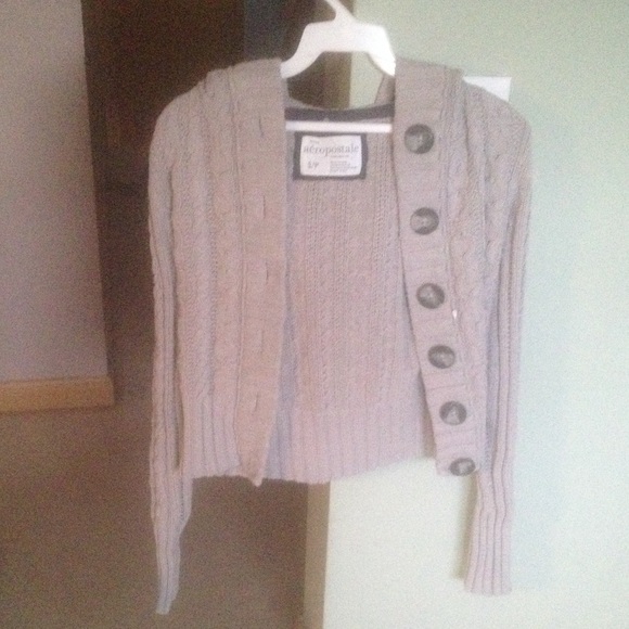 Long grey sweater.