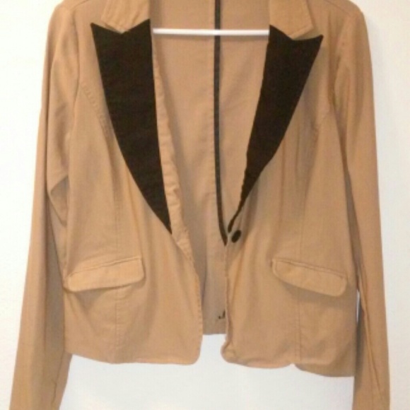 Begie and black blazer