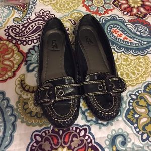 Black buckle flats