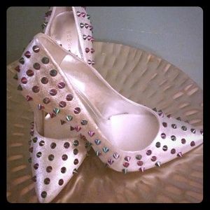 RESERVED....Silver spiked BCBG pumps
