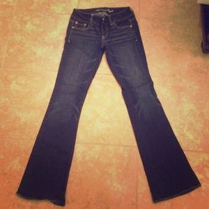 Boot cut dark washed stretchy jeans