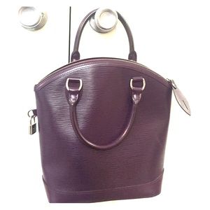 lV dark purple purse .