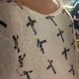 White sweeter with black crosses