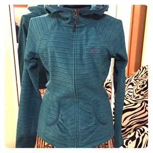 The North Face striped zip up fleece size small.