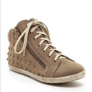 Distressed high top sneakers