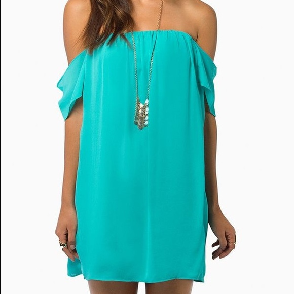 Tobi showing off dress