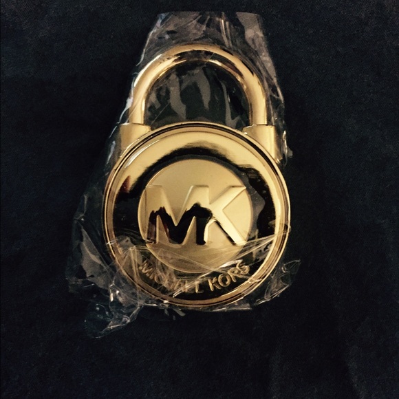 Michael Kors gold lock