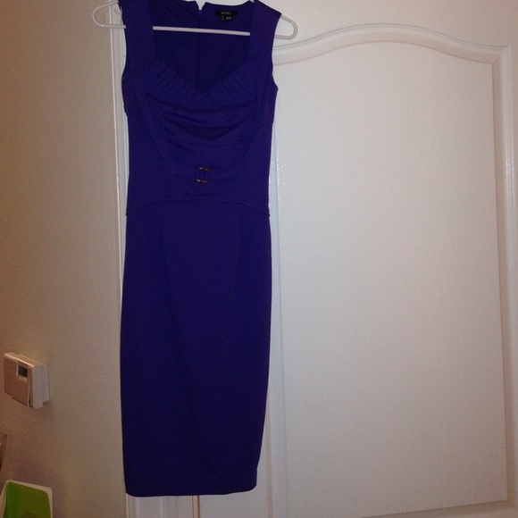 A purple knee length dress