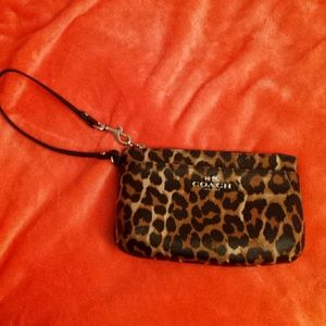 Authentic Coach cheetah wristlet