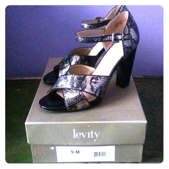 Sexy high heel snake skin sandal, barely worn.