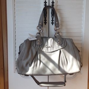 Brand new, with tags Coach slate satchel.