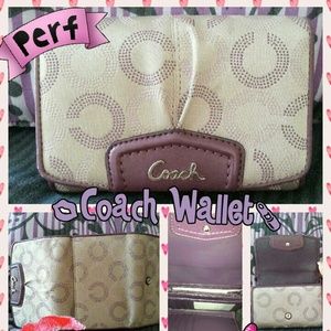 Authentic Coach trifold wallet in purple color